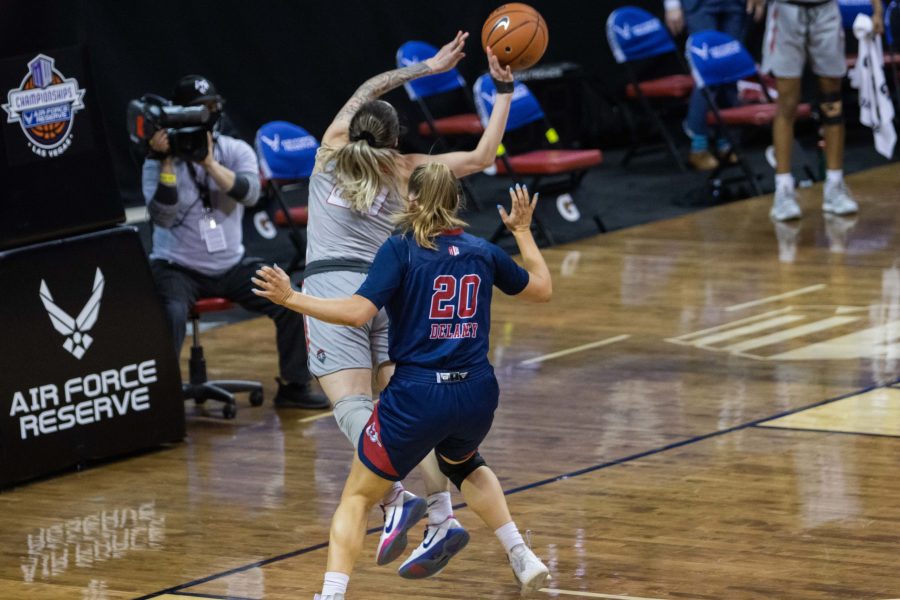 Jaedyn De La Cerda (23) attempts to make a shot while going out of bounds, during the Air Force Reserve Mountain West Women's basketball tournament Mar. 9. California State University Fresno upset the New Mexico 77-72. (Devin Cornelius | Collegian