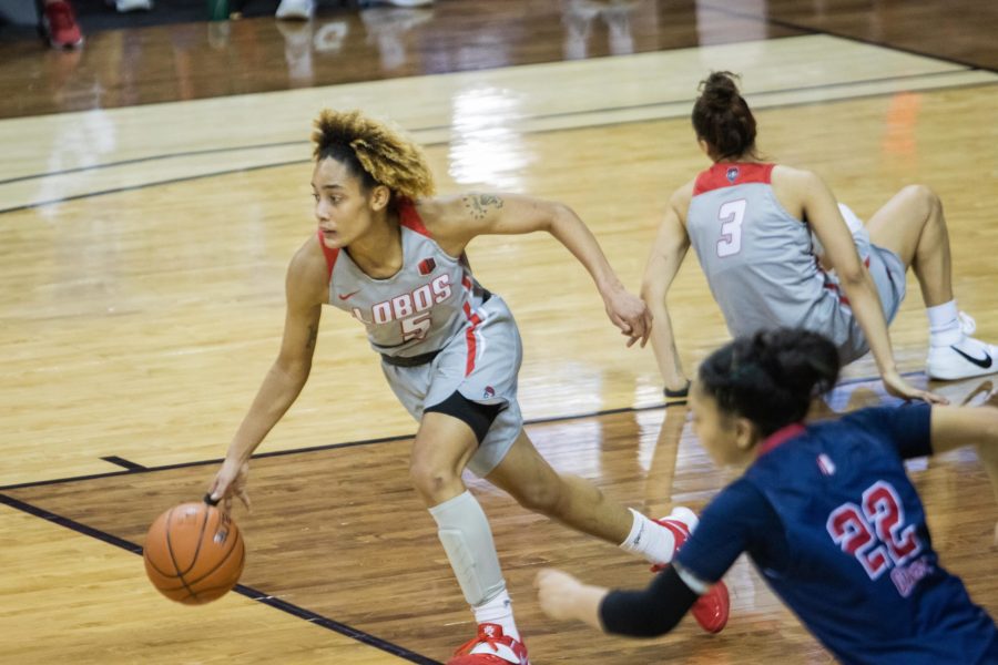 LaTora Duff (5) drives down the court after getting a loose ball, during the Air Force Reserve Mountain West Women's basketball tournament Mar. 9. California State University Fresno upset the New Mexico 77-72. (Devin Cornelius | Collegian) 