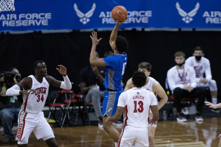 A.J. Walker (10) shoots over a defender during the Air Force Reserve Mountain West men's basketball tournament in Las Vegas. The University of Nevada Las Vegas defeats the United States Air Force Academy 80-52. (Devin Cornelius | Cornelius)