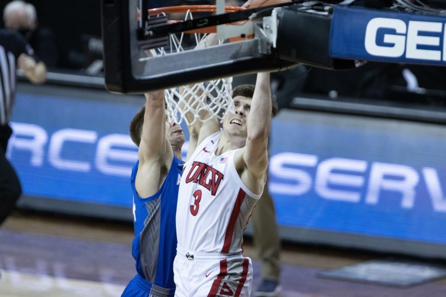 Caleb Grill (3) dunks the ball after a steal, during the Air Force Reserve Mountain West men's basketball tournament in Las Vegas. (Devin Cornelius | Cornelius)