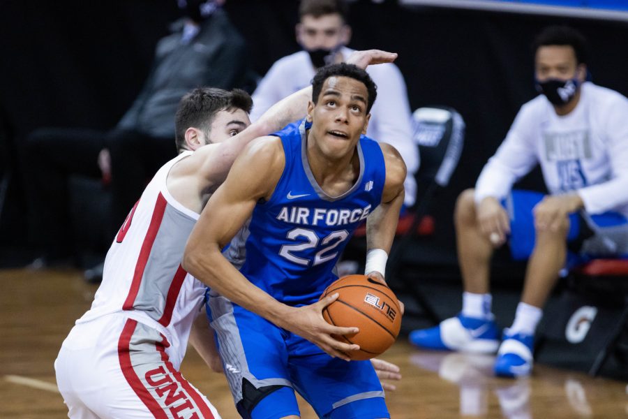 Nikc Jackson (22) drives past a defender and prepares to shoot, during the Air Force Reserve Mountain West men's basketball tournament in Las Vegas. The University of Nevada Las Vegas defeats the United States Air Force Academy 80-52 (Devin Cornelius | Cornelius)