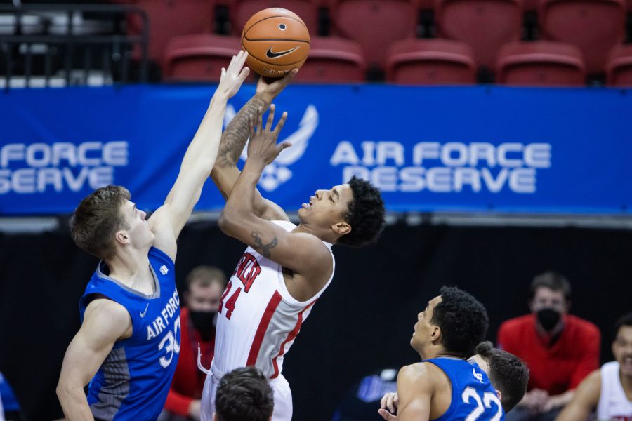 Kendrick Gilbert (24) shoots over a defender, during the Air Force Reserve Mountain West men's basketball tournament in Las Vegas. The University of Nevada Las Vegas defeats the United States Air Force Academy 80-52 (Devin Cornelius | Collegian)