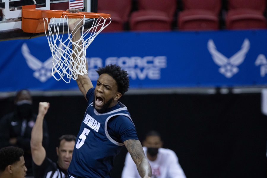 Warren Washington (5) celebrates after a dunk Mar. 12, during the Air Force Reserve men's basketball tournament in Las Vegas Nevada. the University of Nevada loses to San Diego State University 77-70. (Devin Cornelius | Collegian) 
