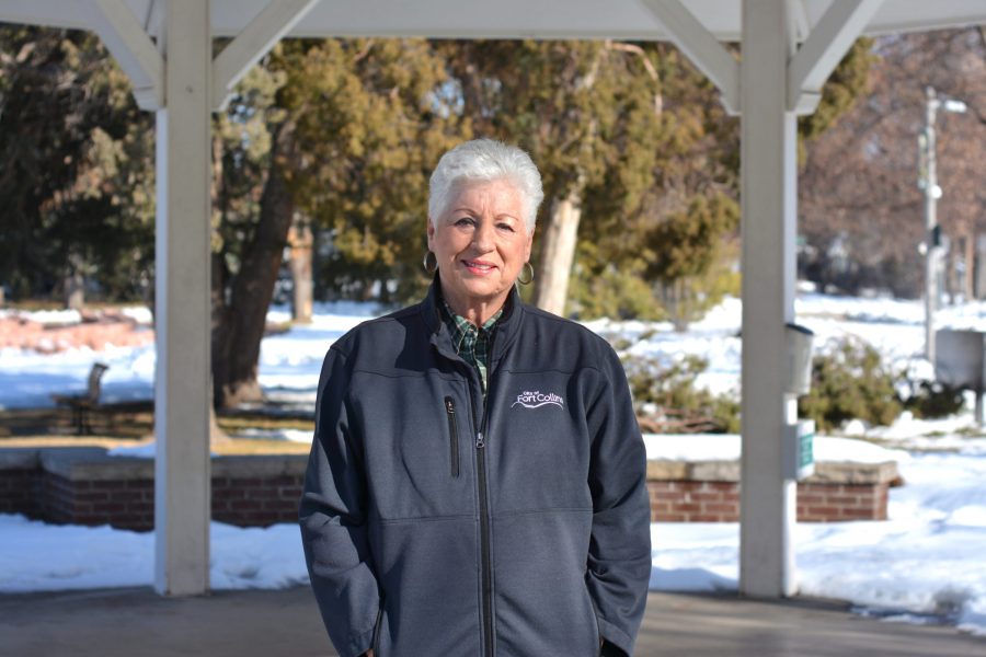 Susan Gutowsky stands in the gazebo at the Annual Flower Trial Gardens. Gutowsky is a candidate for City Council District 1 March 19. (Lennon Brooks | The Collegian)