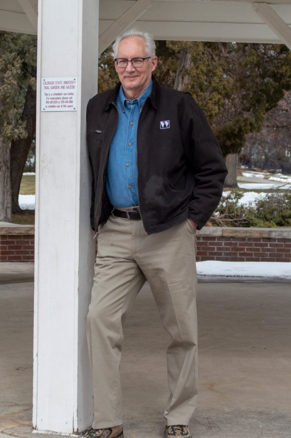 Kelly Ohlson takes a break from campaigning for Fort Collins City Council to pose outside of the Historic Fort Collins High School, March 21. (Laurel Sickels | The Collegian)