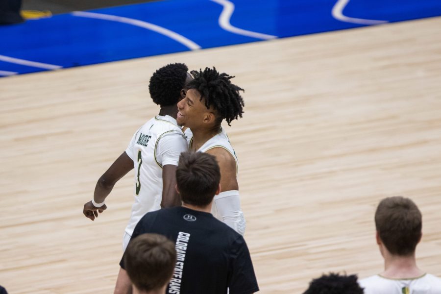 Kendle Moore (3) and P.J. Byrd (5) celebrate after Colorado State University defeats North Carolina State University in the National Invitation Tournament quarterfinal game in Fresco, Texas the Comerica Center March 25. Colorado State beat NC State 65-61. (Devin Cornelius | The Collegian)