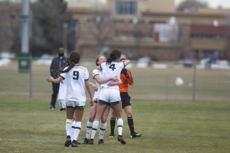 Kaitlyn Abrams (11) hugs Taylor Steinke (4) after she scored a go ahead goal in he Colorado State University Womens Soccer game against Air Force Academy on March 26. The Rams beat the visiting Falcons 1-0 off of Steinkes lone goal. (Gregory James | The Collegian)