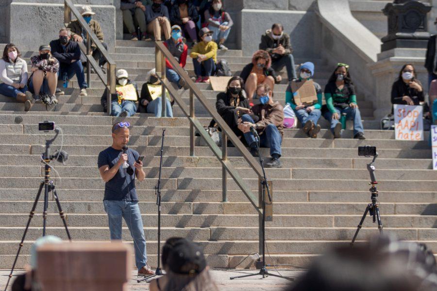 A man speaks to the crowd at a protest outside the Colorado State Capitol March 27. During his speech, he addressed stereotypes and called on the audience to "stop reading White" if they wished to better understand the challenges faced by Asian-Americans and Pacific Islanders. (Michael Marquardt | The Collegian)
