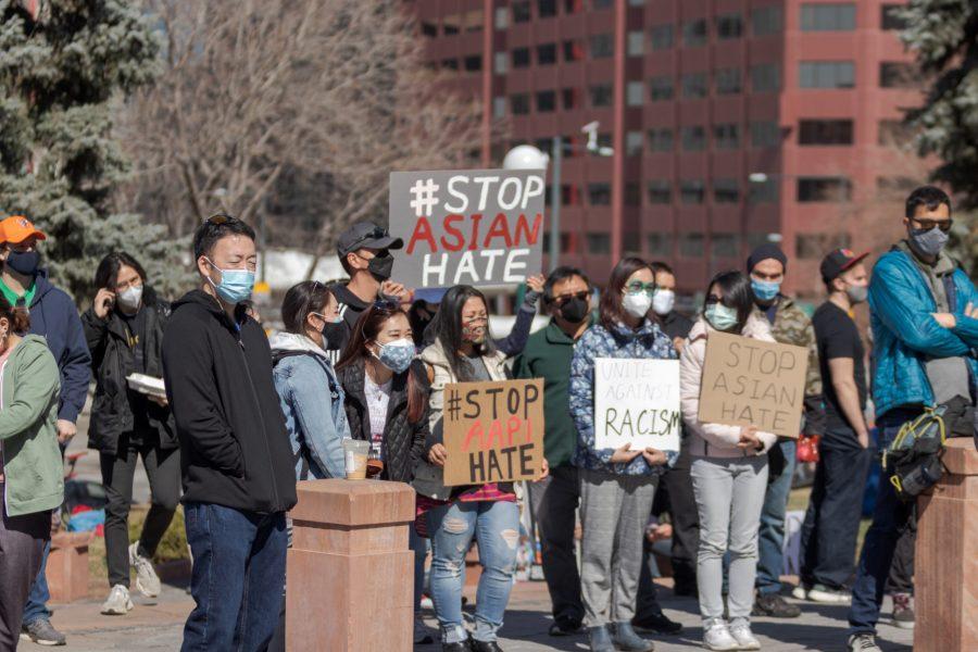 Protesters hold signs outside the Colorado State Capitol March 27. The protest featured speeches, poetry, and music from the Asian-American and Pacific Islander community in response to elevated hate crimes against these aforementioned communities. (Michael Marquardt | The Collegian)