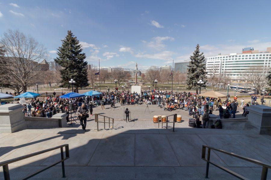 Protesters gather outside the Colorado State Capitol March 27.  The protest featured speeches, poetry, and music from the Asian-American and Pacific Islander community. (Michael Marquardt | The Collegian)