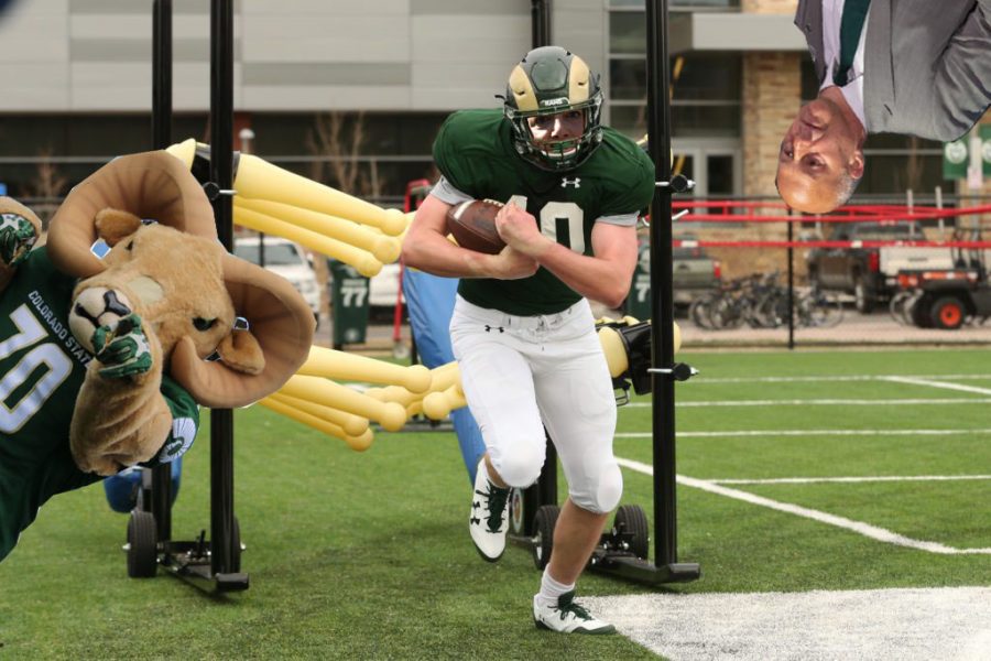 Colorado State running back Joyce McConnell exits the gauntlet machine at Spring Football camp. In an effort to mend the relationship between Athletics and University Administration, Head Football coach Steve Addazio has offered a half-ride scholarship to CSU President Joyce McConnell to fill the teams need for a running back. (Grandiose Frames | The Unprecedented Times)