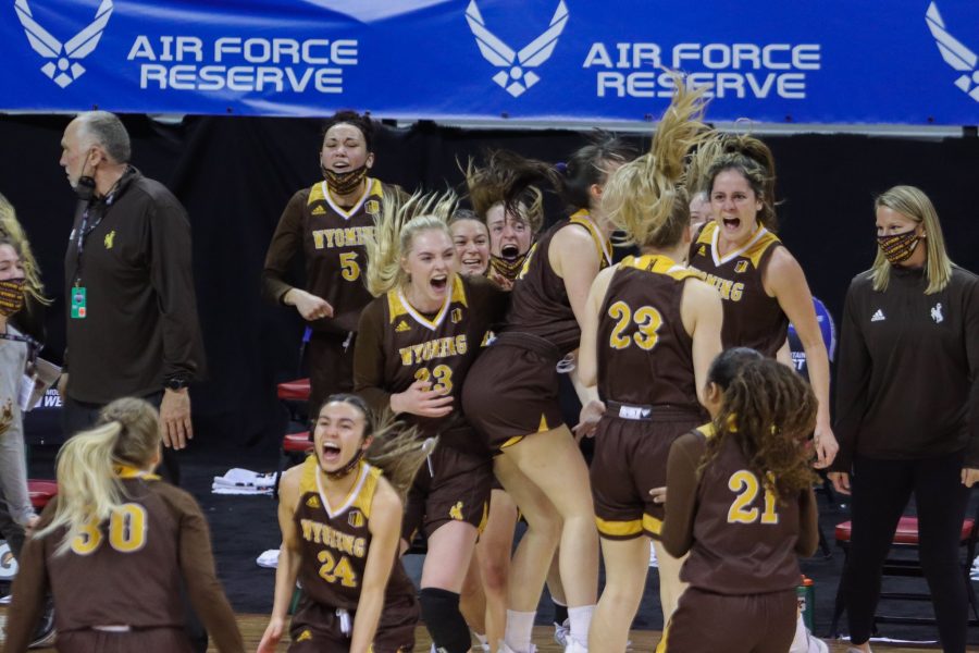 The University of Wyoming womens basketball team celebrates their upset win over Boise State University in the Air Force Reserve Mountain West semifinals. 