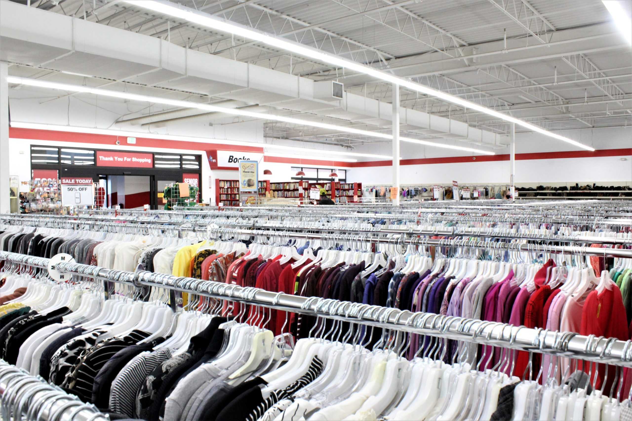 clothing racks inside of arc thrift store