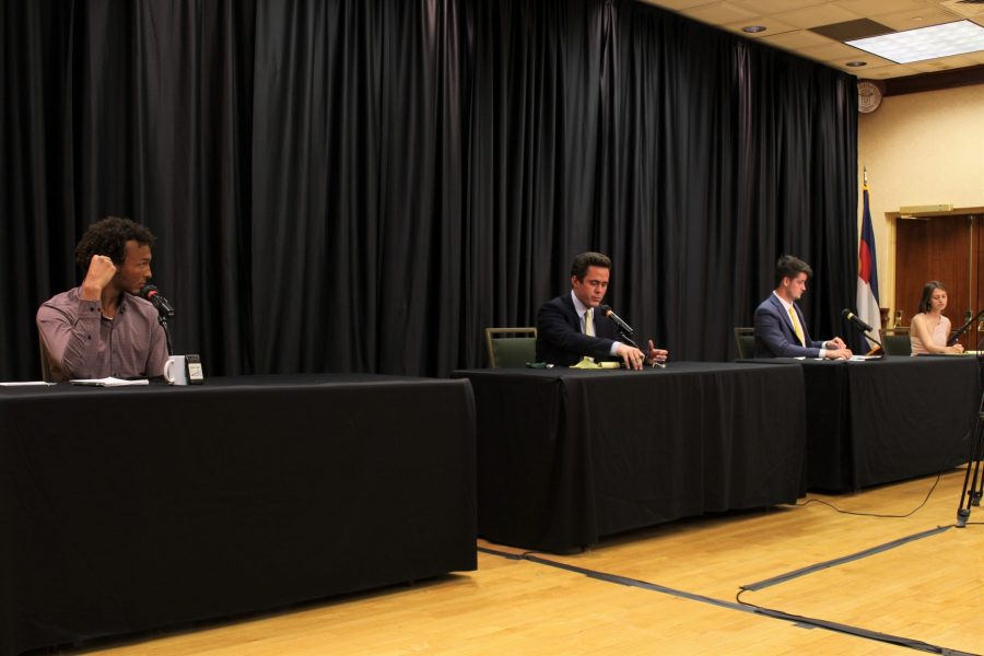 Pictured from left Cinque Mason, Christian Dykson, John Williamson, and Lys Taddei speak at the Associated Students of Colorado State University 2021-2022 Presidential Debate March 24. (Cat Blouch | The Collegian)