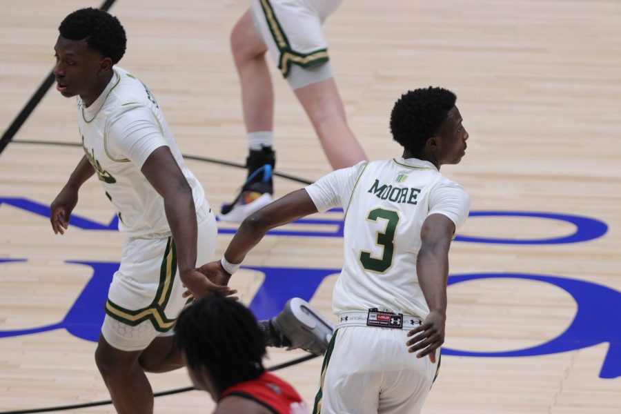 Isaiah Stevens and Kendle Moore celebrate a bucket in their game against North Carolina State University. Colorado State would win 65-61 in the quarterfinal round of the National Invitation Tournament. (Devin Cornelius | The Collegian)