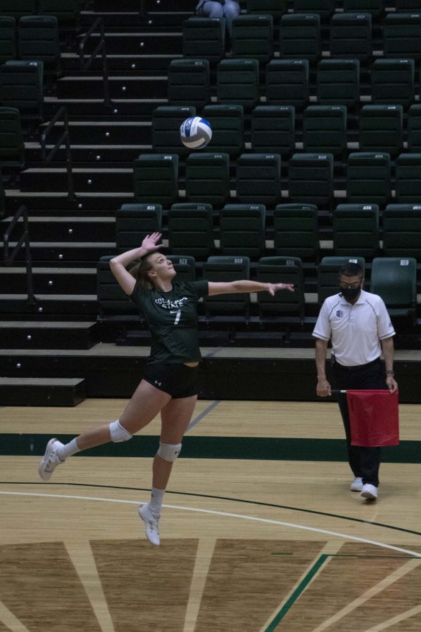 Colorado State University volleyball player Sasha Colombo winds up for a serve during the last home game of the season against Utah State. CSU won 3-1. (Anna von Pechmann | The Collegian) 