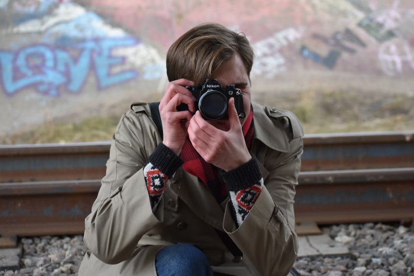 Lennon Brooks poses getting ready to take a picture. (Lennon Brooks | The Collegian)