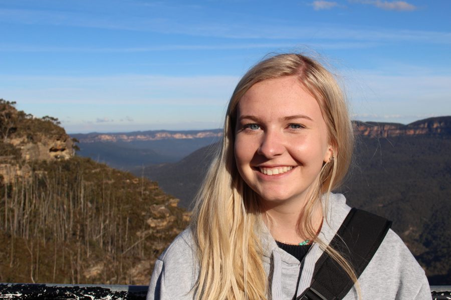 Anna Tomka poses in front of the Blue Mountains in Sydney, Australia. (Anna Tomka | The Collegian)