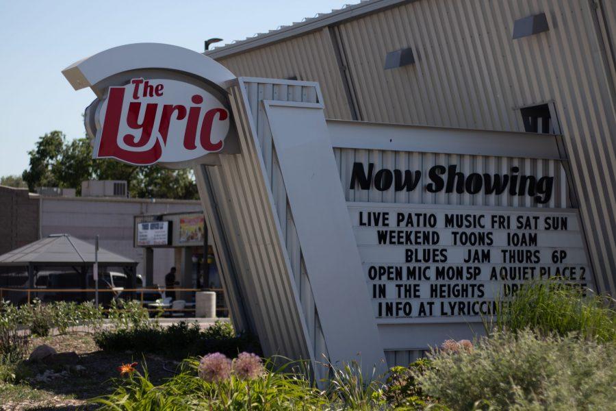 A sign outside The Lyric advertises its weekly open mic nights June 14, 2021.