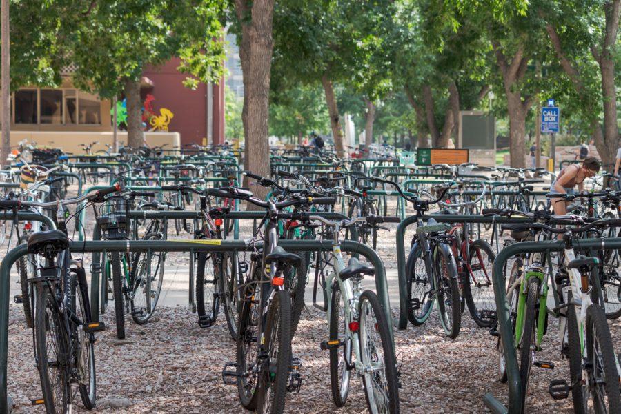 Bicycles sit chained in a bike rack outside the Andrew G. Clark building Aug. 30, 2021. 