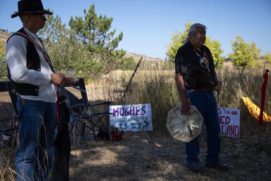 David Young and Kenny Frost address the crowd gathered west of the Aggie Greens Disc Golf Course at a press conference held by the Hughes Land Bank initiative in Fort Collins Sept. 18, 2021. The press conference came after the dismantling of a sweat lodge constructed in the same place by an unknown person or group. (Serena Bettis | The Collegian)