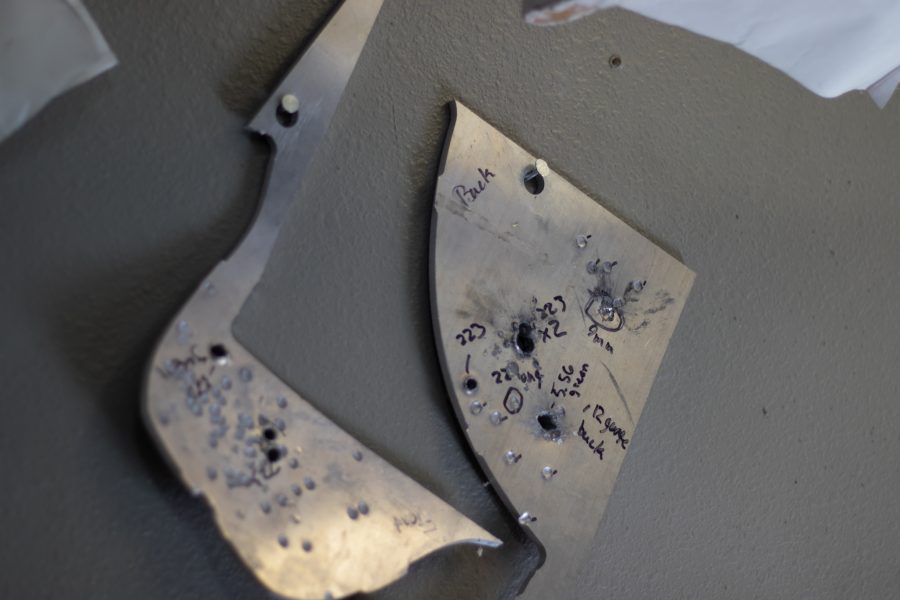 Dylan Edmiston, creator of the Mark I Iron Man suit from Fort Collins, tests gunfire against his suit's metal skeleton Sept. 19. The current Mark I suit has gaps between the malleable metal, making the pilot prone to damage, but future suits will be fully protected against projectiles. (Grayson Reed | The Collegian)