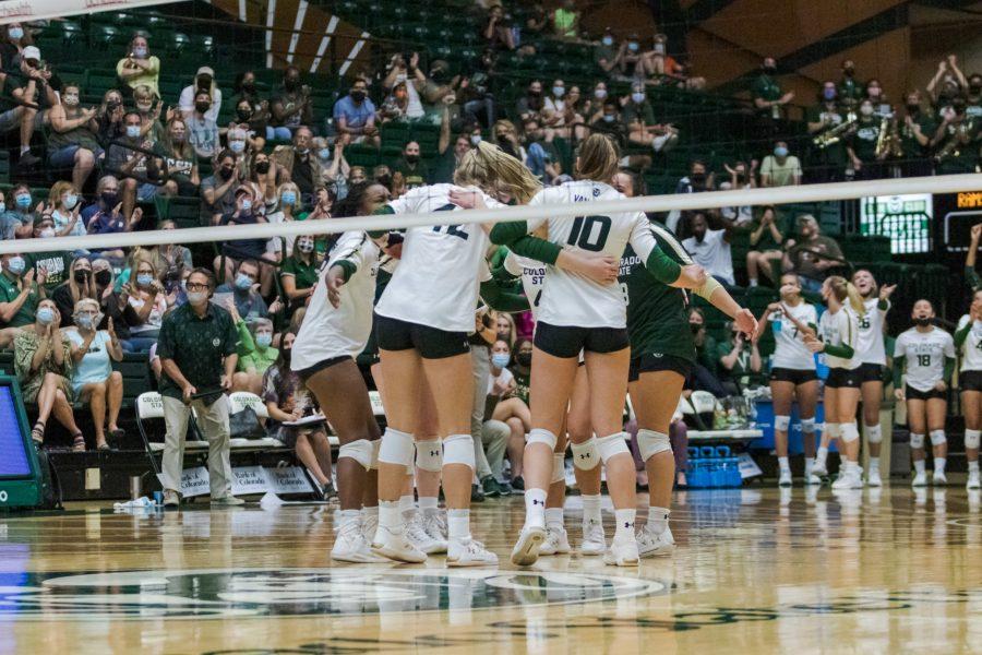 Colorado State University Womens Volleyball players celebrate after scoring during the game against the University of Colorado Boulder Sept. 18. CU won 3-0. (Michael Marquardt | The Collegian)
