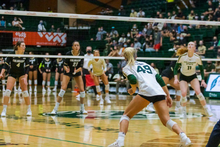 Colorado State University Defensive Specialist Ruby Kayser (49) prepares to hit the ball ball during the volleyball game against the University of Colorado Boulder Sept. 18. CU won 3-0. (Michael Marquardt | The Collegian)