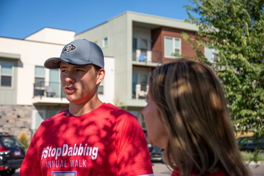 Turin Priola and his mother, Michelle converses about their experience of marijuana recovery at Central Park in Highlands Ranch, Colorado Sept. 19. Priola decided to stop the use of cannabis because it affected his daily interactions with family and friends.  (Tri Duong | The Collegian)