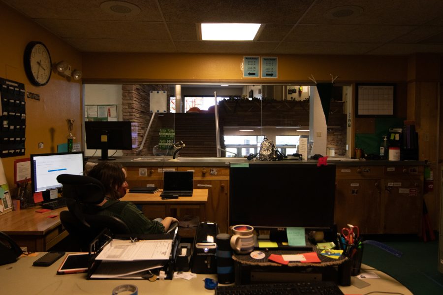Colorado State University student manages reception office alone in Newsom Hall Sept. 24. (Grayson Reed | The Collegian)