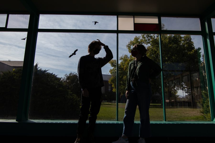 Colorado State University students chat in between buildings in Newsom Hall Sept. 24. (Grayson Reed | The Collegian)