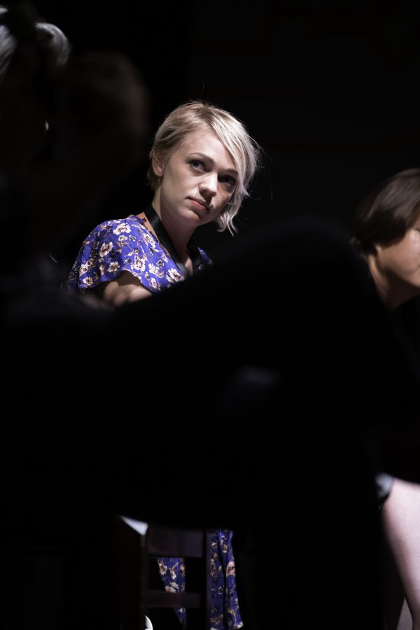 Hannah Smith listens as Johnny Clay speaks at the Horsetooth Int'l Film Festival. Also known as HIFF the film festival took place at the Lyric in Fort Collins Colorado form September 8th to September 12th 2021.   