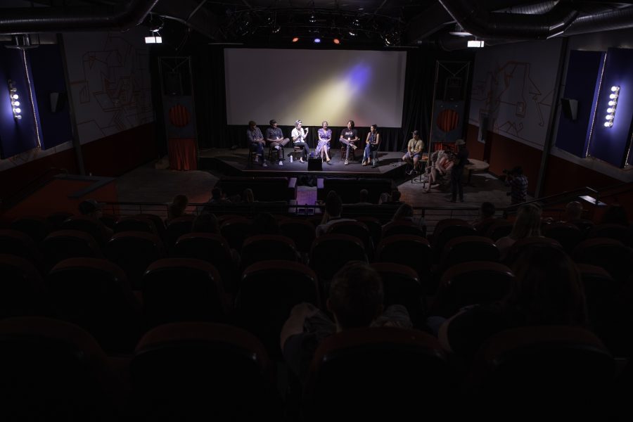 Audience Members listen and watch as panelists discuss what being part of the film industry is like. Taken from the seats of one of the Lyric's theaters. this event was the HIFF Horsetooth Int'l Film Festival. From left to right, Amy Marquis, Michael Goodman, Hannah Smith, Christi Clay, Dave Gulick, Johnny Clay.