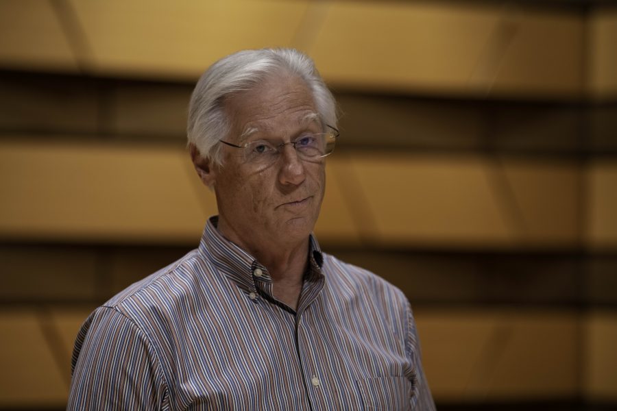 Wesley Kenney, professor at Colorado State University School of Music, Theatre, and Dance, stands on stage in the concert hall in the Center for the arts building. Quote "It has been almost twenty months since we have preformed in front of a live audience. We are so excited... it is who we are."    