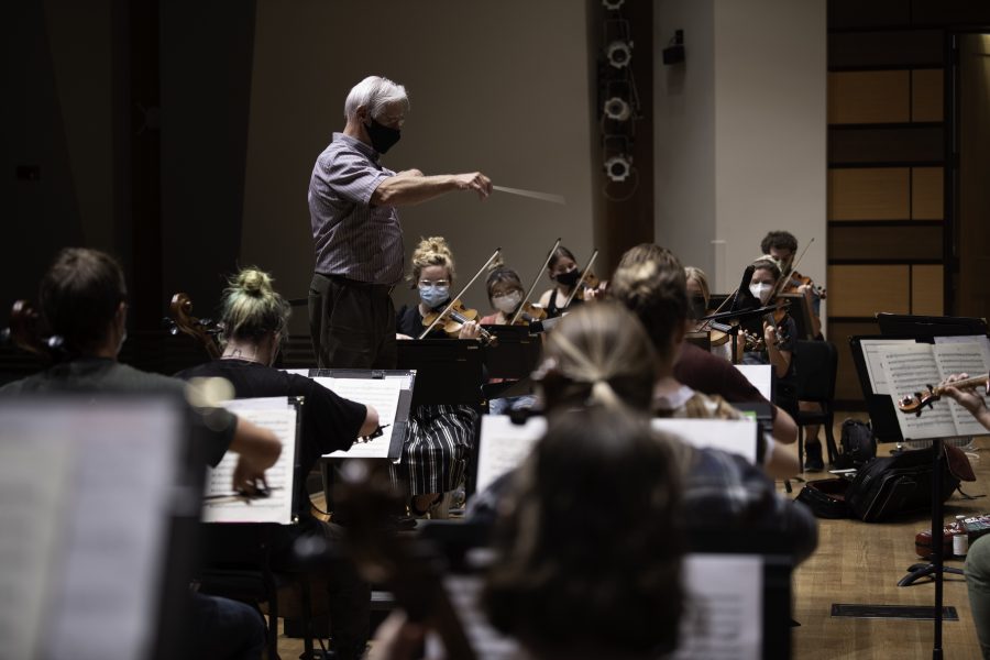 Wesley Kenney, professor and conductor at the Colorado State School of Music, Theatre and Dance prepares his students for an upcoming concert Sept.14. Mr. Kenney stated that "It has been almost twenty months since we have performed in front of a live audience. We are so excited... it is who we are." (Garrett Mogel | The Collegian)