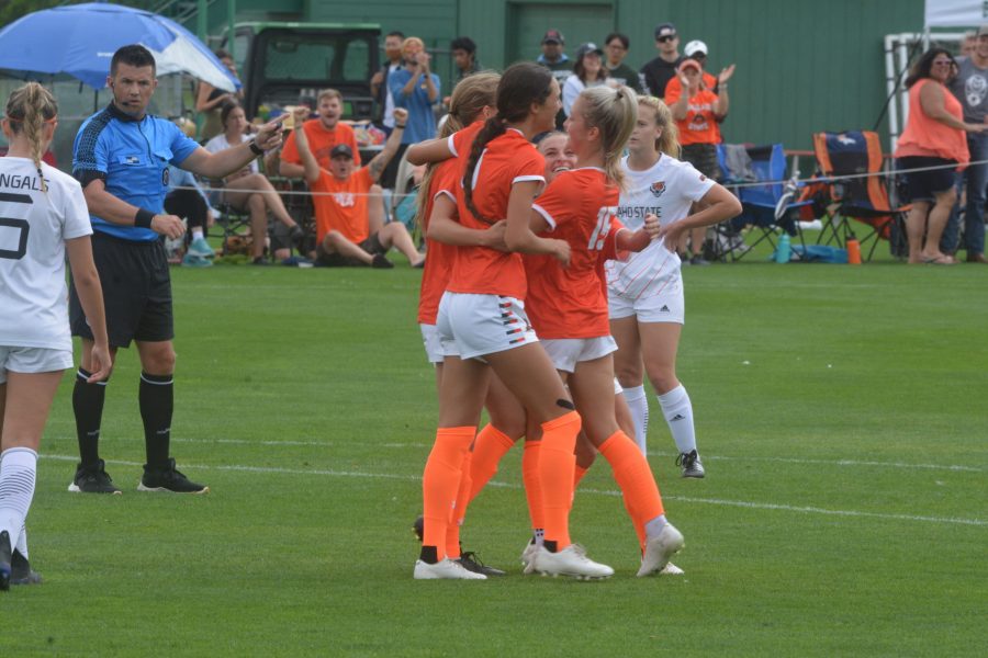 Members of the Colorado State women's soccer team huddle together for a celebration after forward Gracie Armstrong notched the Rams' third goal of the game Sept 12. The Rams went on to win 6-0 against the visiting Idaho State Bengals. (Gregory James | The Collegian)