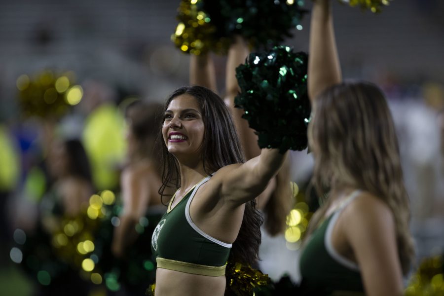 Colorado State University Golden Poms members cheer on the Rams during the football game against South Dakota State University