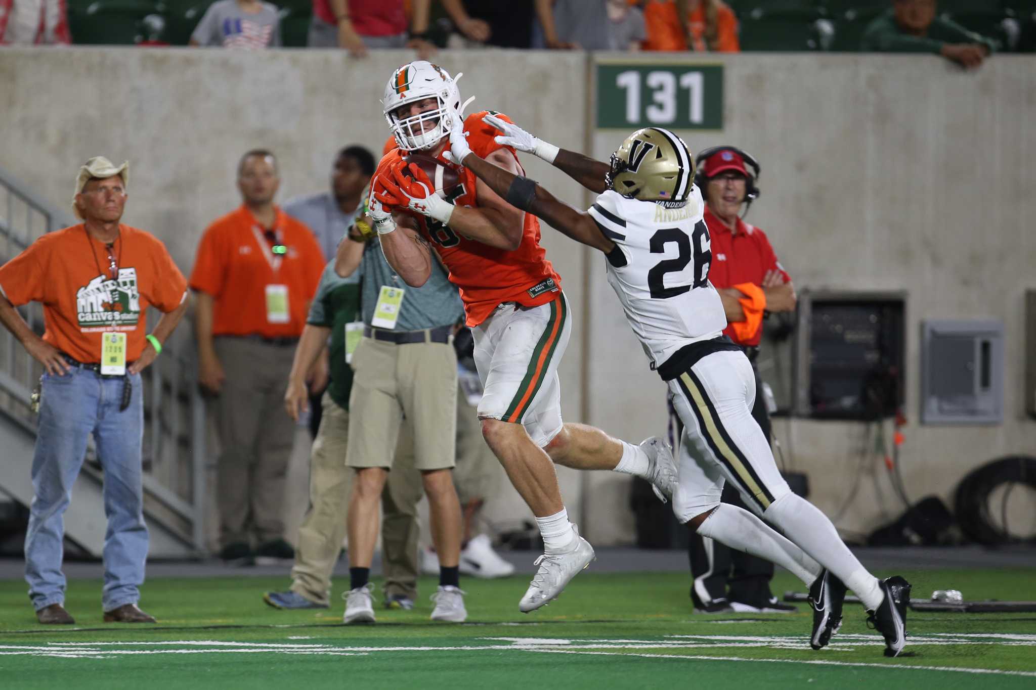 Trey McBride leaps for a pass