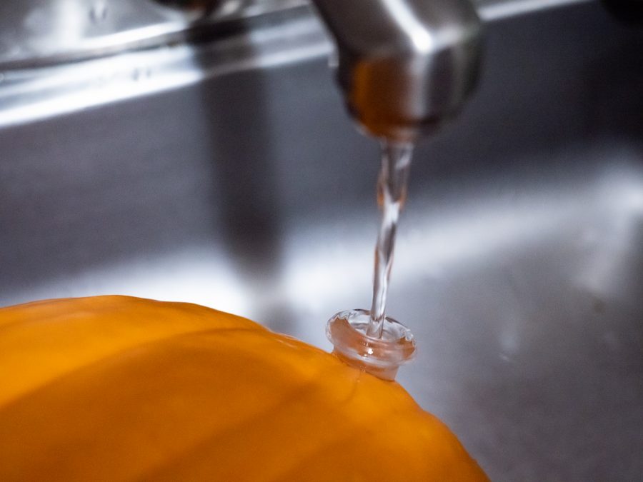 A pumpkin with an added glass attachment at its final stage before the completion of a make shift bong Oct. 3. (Photo Illustration by Tri Duong | The Collegian)