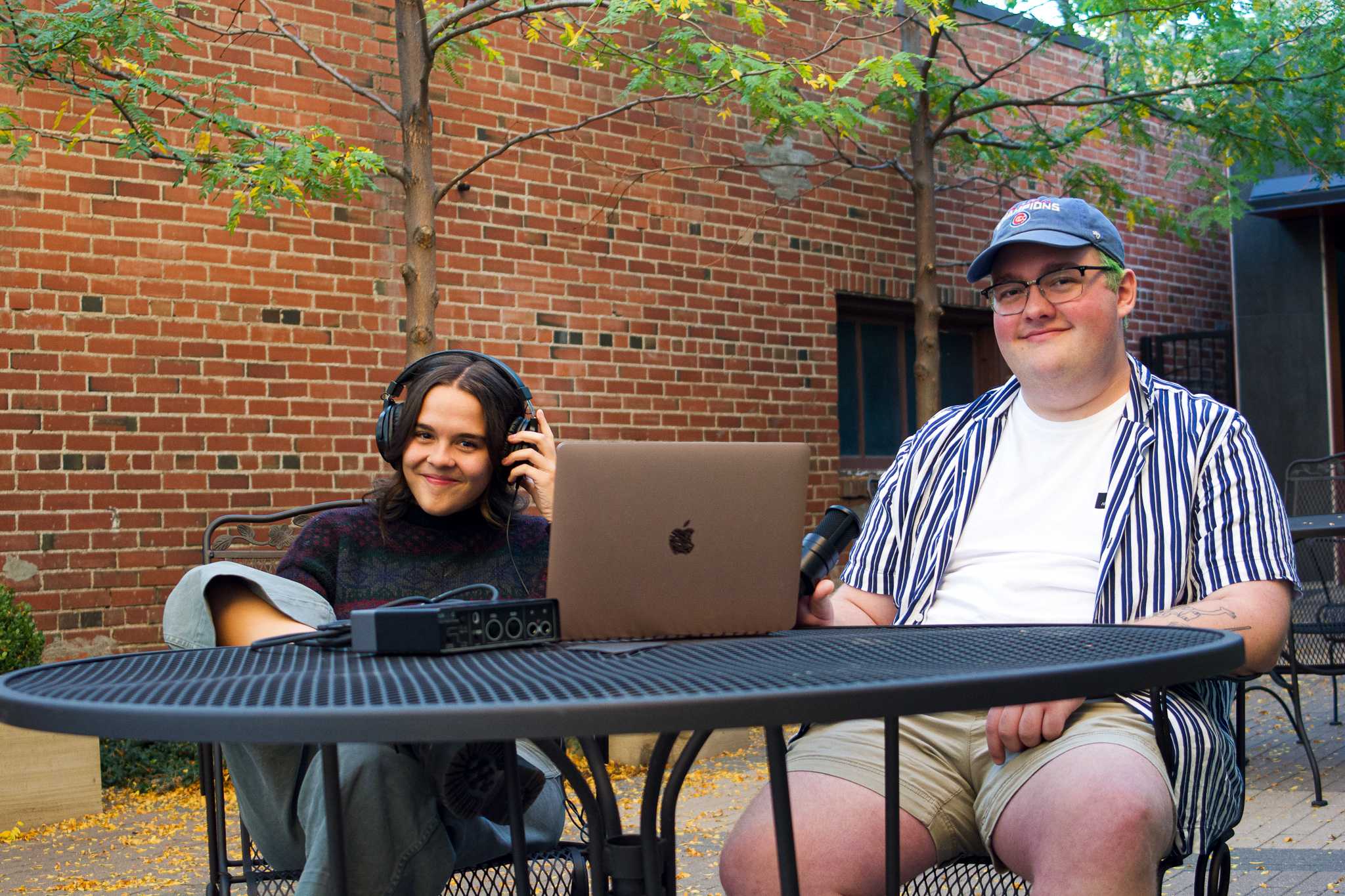 Miranda Fling and Forrest Nelson sit together in Old Town