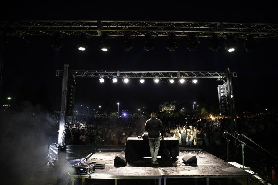 A DJ plays music outside the Colorado State University Lory Student Center for Homecoming Weekend, consisting of a bonfire, lighting of the A and firework display, Oct. 8. (Garrett Mogel | The Collegian)
