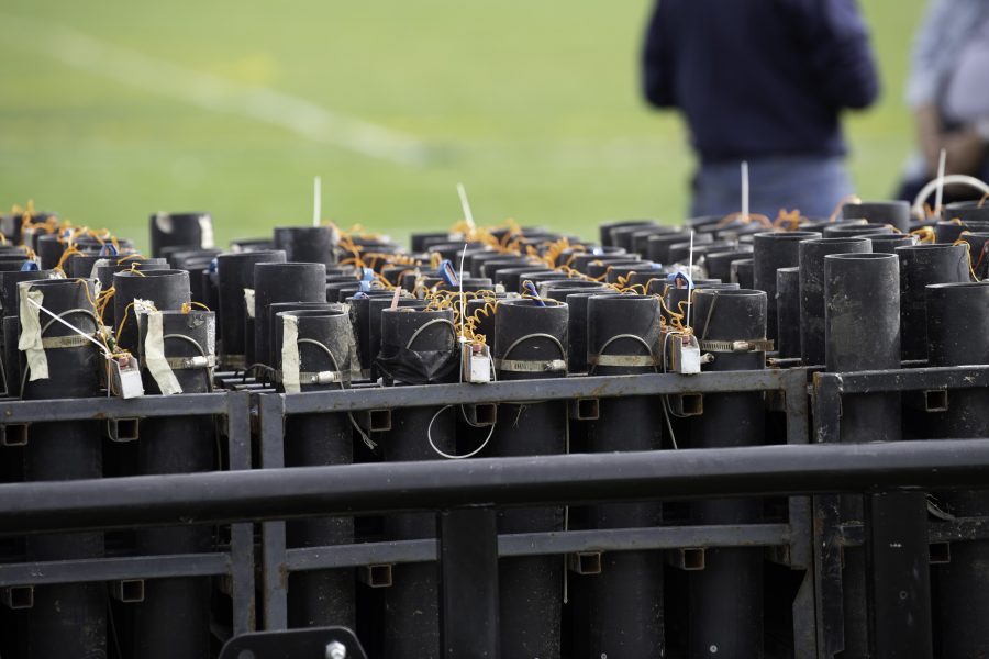The Colorado State University homecoming firework show mortar tubes aligned and primed with Three-inch shells that will leave the tube around 200 miles per-hour climb to around 400 feet into the air and produce a burst diameter of about 150 feet Oct. 8. (Garrett Mogel | The Collegian)