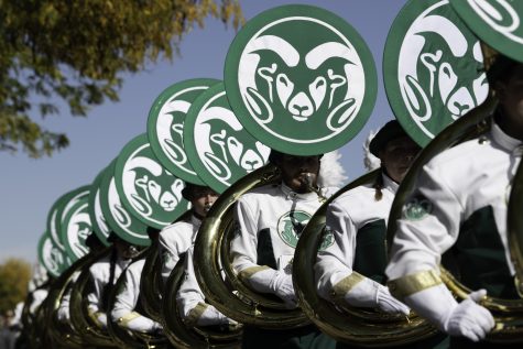 Colorado State University Marching Band Tuba players march toward Canvas Stadium for the homecoming football game against the San Jose State University Spartans. CSU won the game 32-14 Oct. 9. (Garrett Mogel | The Collegian)