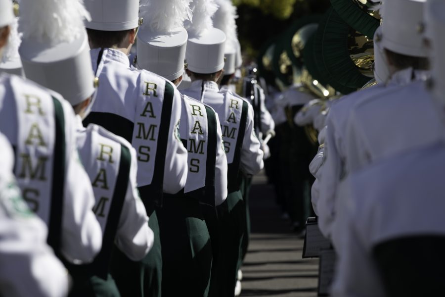 The Colorado State University Marching Band marches in formation to Canvas stadium for the homecoming football game against the San Jose Spartans. CSU won 32-14 Oct. 9. (Garrett Mogel | The Collegian)