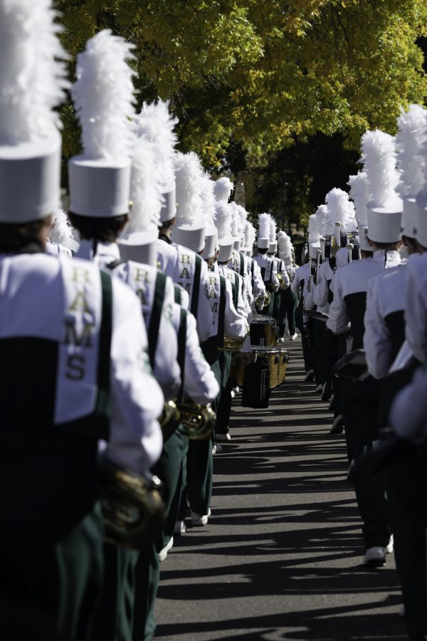 The Colorado State University Marching Band marches in formation to Canvas stadium for the homecoming football game against the San Jose Spartans. CSU won 32-14 Oct. 9. (Garrett Mogel | The Collegian)