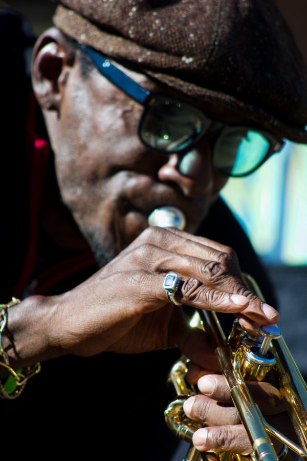 Juan Lee Reed, artist name Fuziion age 43 plays the trumpet in Old Town