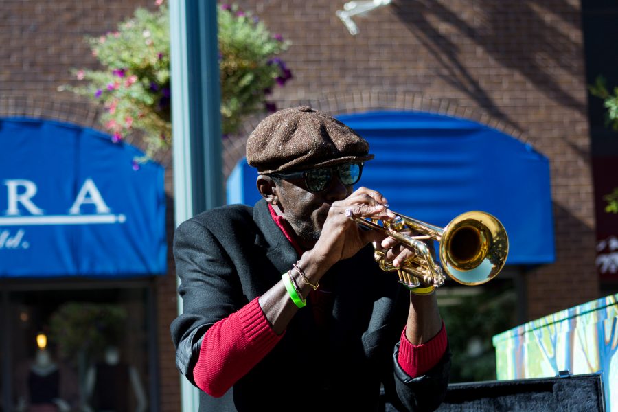 Juan Lee Reed, artist name Fuziion age 43 plays the trumpet in Old Town