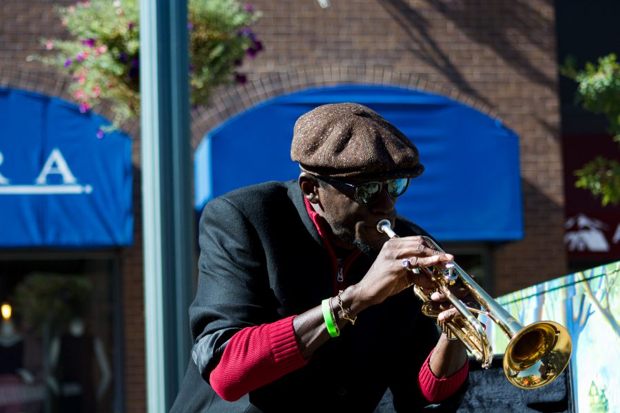 Juan Lee Reed, artist name Fuziion age 43 plays the trumpet in Old Town