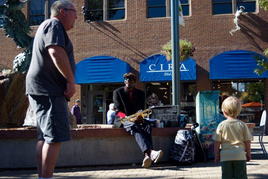 Juan Lee Reed, artist name Fuziion age 43 sits in his usual spot in Old Town