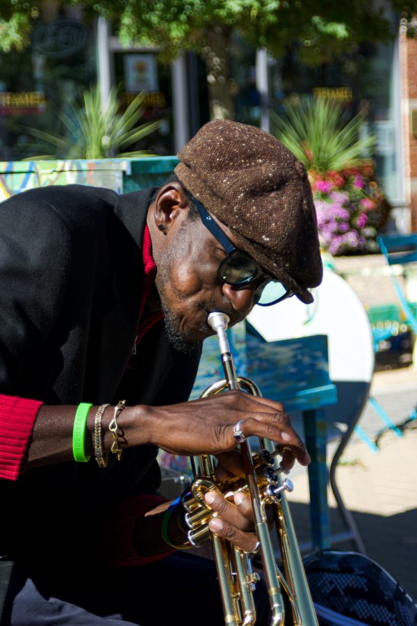 Juan Lee Reed, artist name Fuziion age 43 plays the trumpet in Old Town